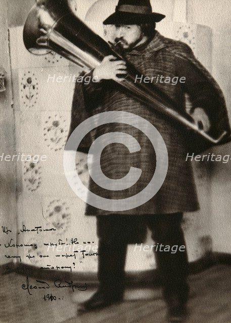 Leonid Andreyev, Russian author, playing a musical instrument, c1900. Artist: Unknown