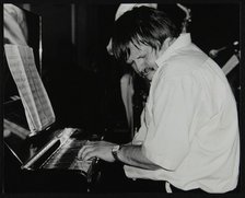Geoff Eales playing the piano at The Fairway, Welwyn Garden City, Hertfordshire, 11 March 2001. Artist: Denis Williams