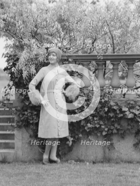Moylair, Catherine, Miss, standing outdoors, 1928 Creator: Arnold Genthe.
