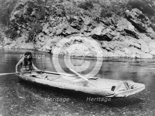 Yurok canoe on Trinity River, c1923. Creator: Edward Sheriff Curtis.