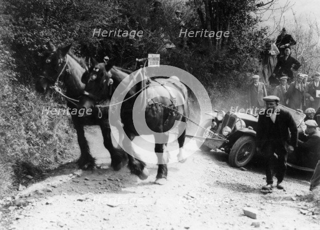 Horses pulling an MG up a hill, c1936. Artist: Unknown