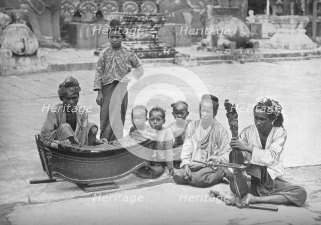 Burmese musicians, 1902. Artist: P Klier.