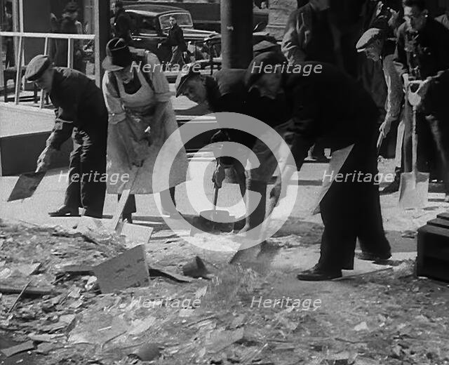 Civilians Clearing up Bomb Damage, 1940. Creator: British Pathe Ltd.