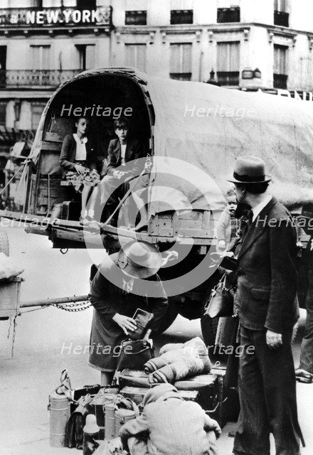 Refugees returning home, Paris, July 1940. Artist: Unknown