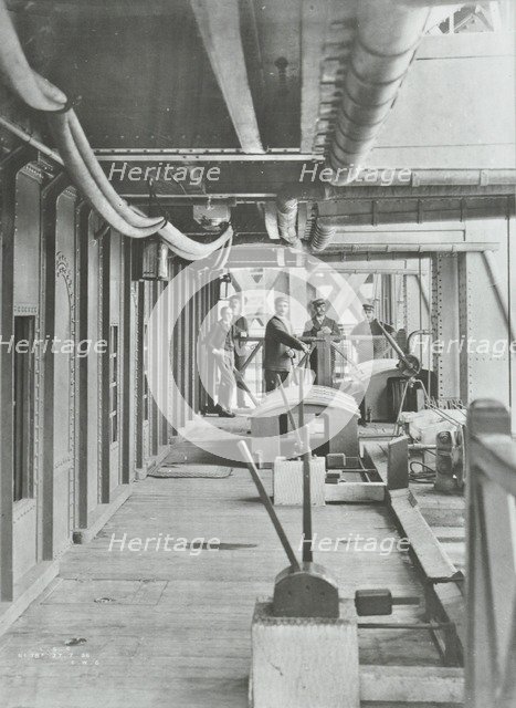 Men on the Hydraulic Lever Platform of the Woolwich Ferry, London, 1896. Artist: Unknown.