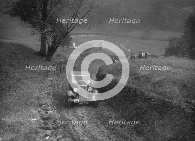 Standard saloon of HSR Payne competing in the MCC Sporting Trial, 1935. Artist: Bill Brunell.