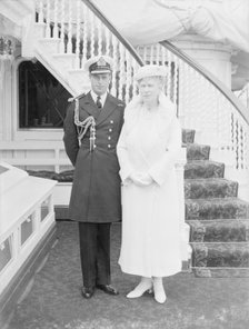 Prince George and Queen Mary aboard 'HMY Victoria and Albert', c1933. Creator: Kirk & Sons of Cowes.