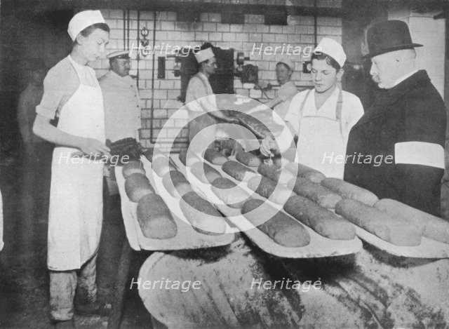 'An inspector visiting a Berlin bakery', 1915.  Artist: Unknown.