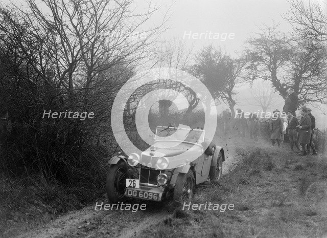 MG F type of GF Horan at the Sunbac Colmore Trial, near Winchcombe, Gloucestershire, 1934. Artist: Bill Brunell.