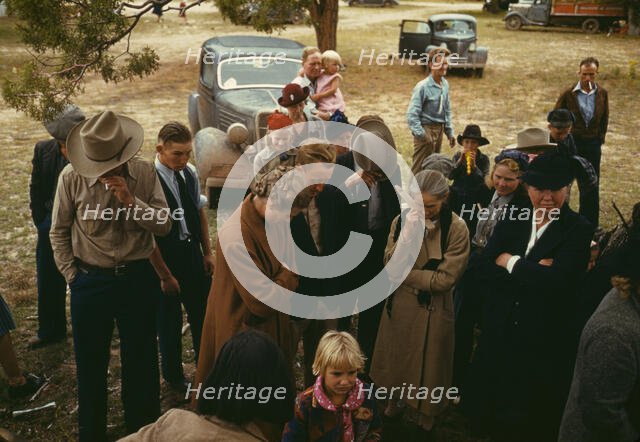 Grace was said before the barbeque was served at the Pie Town, New Mexico Fair, 1940. Creator: Russell Lee.