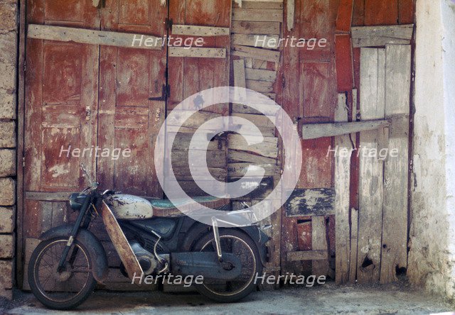 Motorcycle in the street in Khania. Artist: Unknown