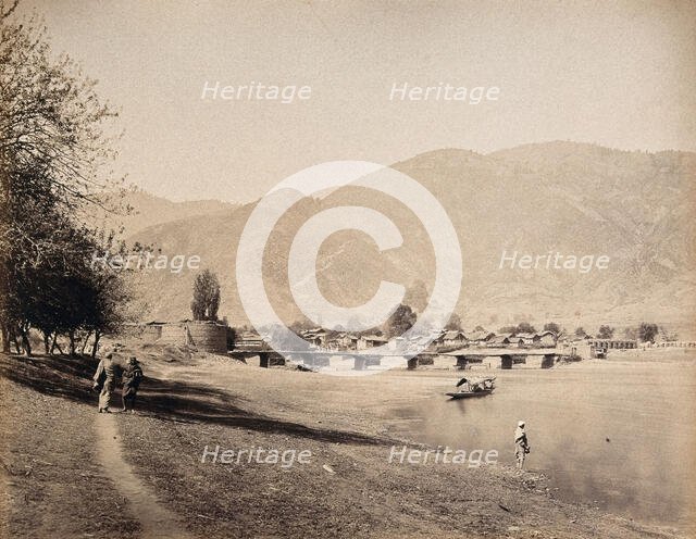A bridge over the river Jehlum with a town, Baramula, Kashmir, India, c1860s. Creator: Samuel Bourne.