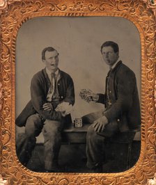 Union Soldiers Sitting on Bench, Playing Cards, 1861-65. Creator: Unknown.