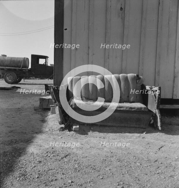 The postmaster's seat, Finlay, Texas, 1937. Creator: Dorothea Lange.