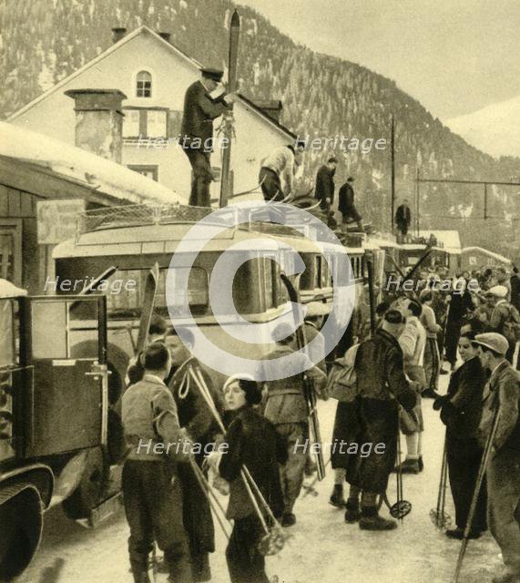 Skiers arriving at St Anton am Arlberg, Austria, c1935.  Creator: Unknown.