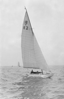 The 18-foot keelboat 'Prudence' (K2) under sail, 1922. Creator: Kirk & Sons of Cowes.