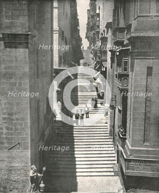 A steep street in Valletta, Malta, 1895.  Creator: W & S Ltd.