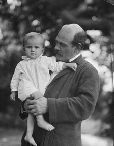 Borglum, Gutzon, Mr., and child, outdoors, 1917 Aug. 18. Creator: Arnold Genthe.