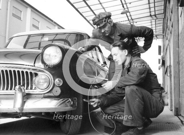Service at a garage, Trelleborg, Sweden, 1950s. Artist: Unknown