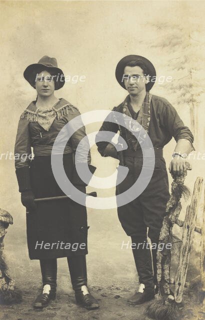 British prisoners of war in cowboy and cowgirl costumes posing at...(1910 - 1919?). Creator: Paul Tharan.