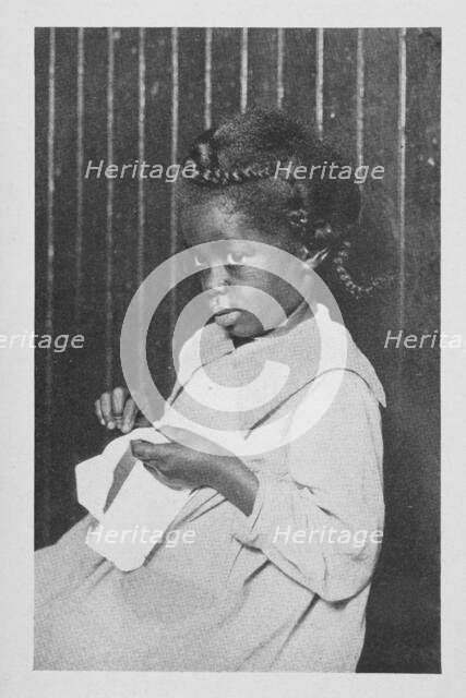 An African American girl; Caroline's play, 1922. Creator: Unknown.