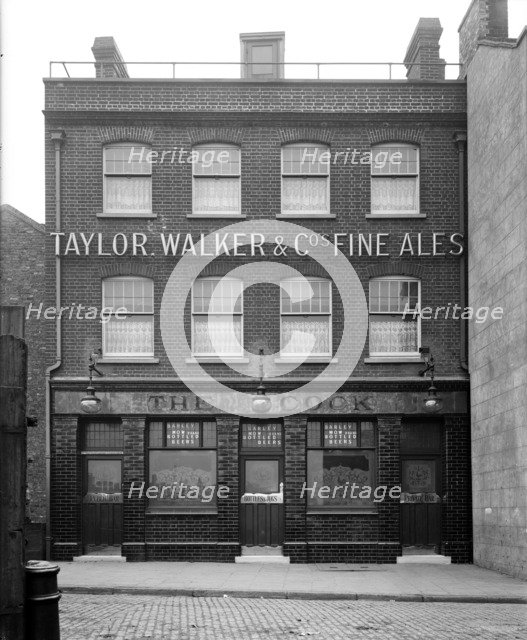 The Cock public house, Shadwell High Street, London, 1912. Artist: Bedford Lemere and Company