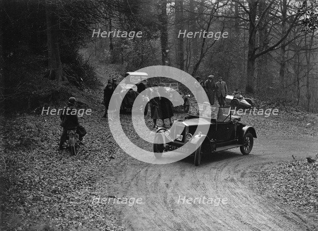 Wolseley 11 competing in the Sunbeam Motor Car Club Bognor Trial, 1929. Artist: Bill Brunell.