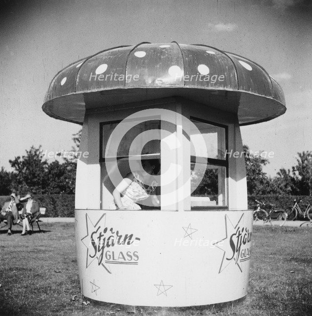 Ice cream stall shaped like a toadstool, Landskrona, Sweden, 1950. Artist: Unknown
