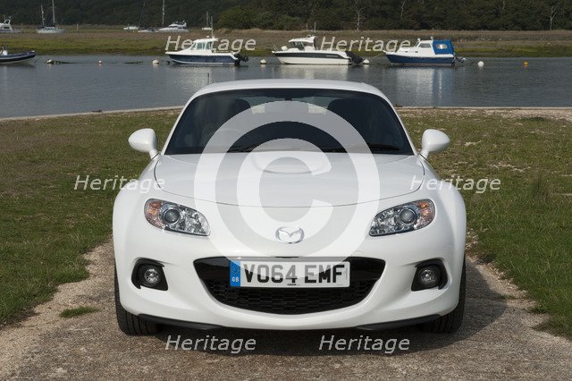 2014 Mazda MX5 Roadster Coupe Artist: Unknown.