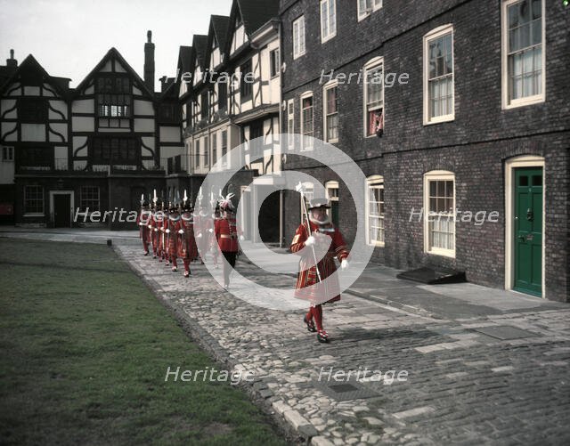Yeomen Warders, Easter Sunday Parade led by the chief warder, Tower of London, 1954.   Creator: Arthur Charles Kirby Ware.