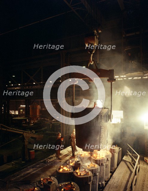 Teeming (pouring) molten iron, Brown Bayley Steels, Sheffield, South Yorkshire, 1968.  Artist: Michael Walters