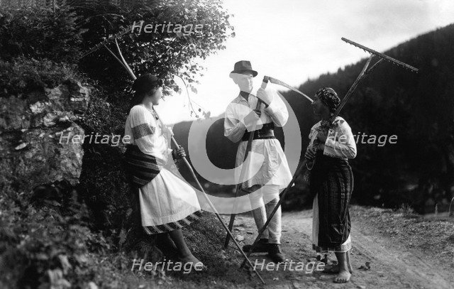 Farm workers with scythes and rakes, Bistrita Valley, Moldavia, north-east Romania, c1920-c1945. Artist: Adolph Chevalier