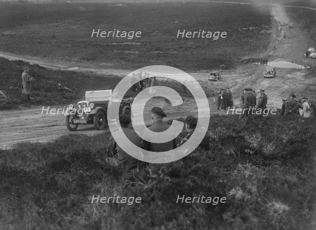 Morris Minor competing in a motoring trial, Bagshot Heath, Surrey, 1930s. Artist: Bill Brunell.