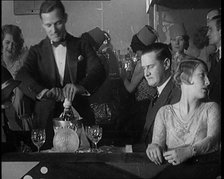 People Drinking Alcohol in Prohibition Era United States of America, 1929. Creator: British Pathe Ltd.