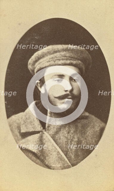 Head-and-shoulders portrait of a man, dressed in convict clothing, facing..., between 1880 and 1886. Creator: Unknown.