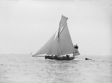 The yawl 'Lola' under sail, 1913. Creator: Kirk & Sons of Cowes.