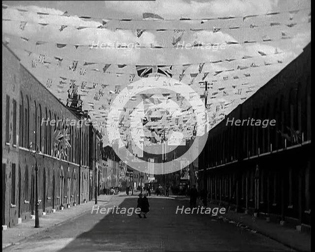 A Street is Decorated With Bunting For the Coronation of George VI, 1937. Creator: British Pathe Ltd.