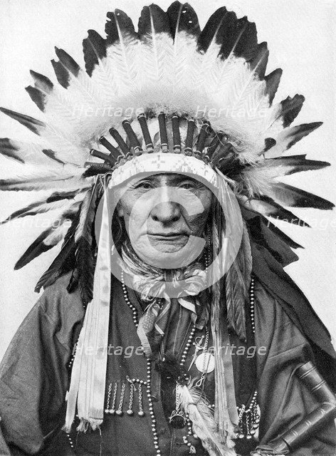 A Native American chief wearing his headdress. Artist: Unknown
