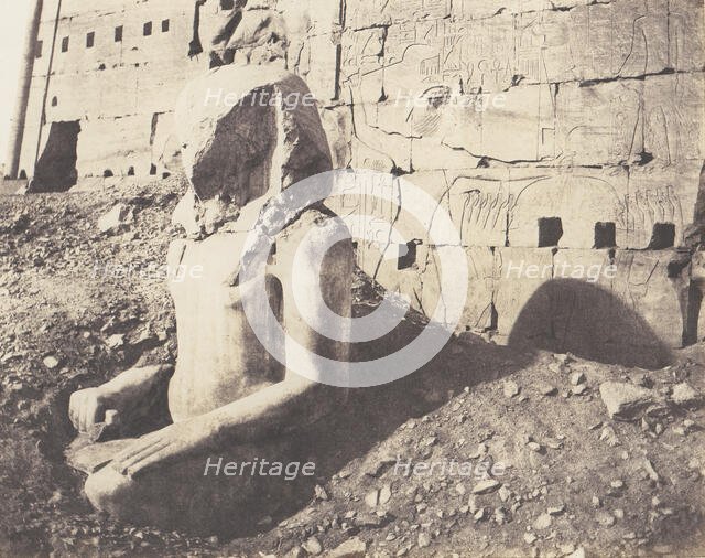 Karnak (Thèbes), Troisième Pylône - Colosse de Spath Calcaire, en D, 1851-52, printed 1853-54. Creator: Félix Teynard.