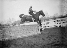 Horse Shows - Unidentified Men, Mtd. Or Hurdling, 1911. Creator: Harris & Ewing.