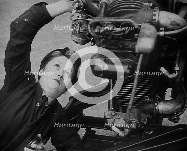 A Woman Working on an Aeroplane Engine, 1942. Creator: British Pathe Ltd.