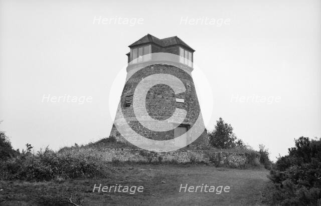 East Knoyle Tower Mill, Windmill Hill, East Knoyle, Wiltshire, 1940.  Creator: HES Simmons.