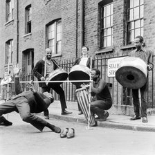The Irwin Clement Caribbean steel band, possibly in Stalbridge Street, Marylebone, London, 1963. Creator: Henry Grant.