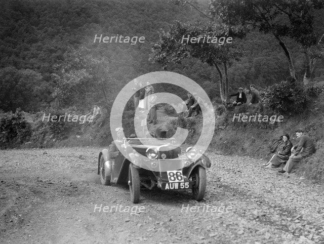 Singer sports 2-seater at the Mid Surrey AC Barnstaple Trial, Beggars Roost, Devon, 1934. Artist: Bill Brunell.
