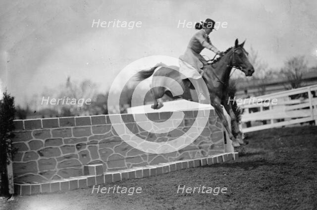 Horse Shows - Miss Martha Hazard, Hurdling And On Foot, 1911. Creator: Harris & Ewing.