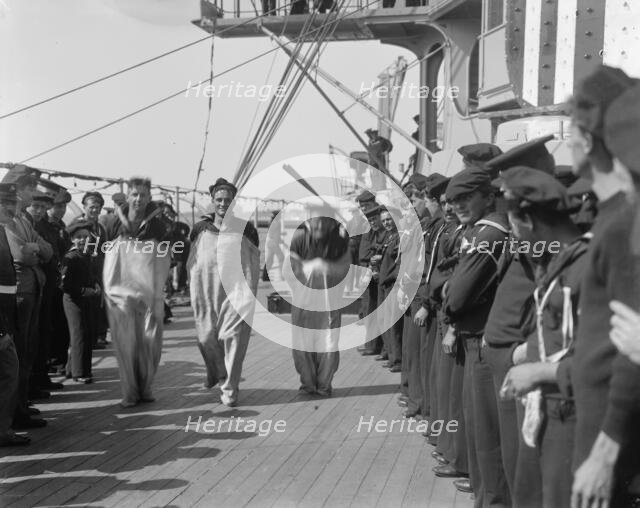 U.S.S. New York, sack race, anniversary of Santiago, 1899 July 3. Creator: Unknown.