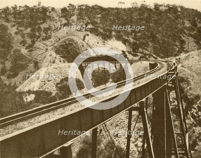 'Train Passing Over Viaduct, Mount Lofty Range, South Australia', 1930. Creator: Unknown.