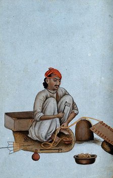 Delhi: a goldsmith at work, (between 1800 and 1899?). Creator: Unknown.
