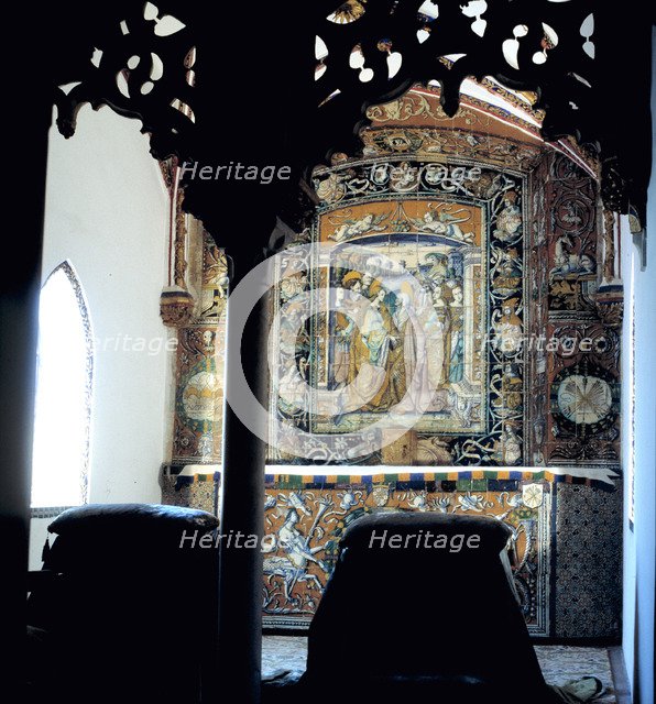 Inside the Alcazar of Seville, oratory of the Catholic Monarchs with a beautiful altar in ceramic…