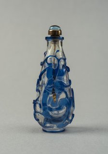 Clear glass snuff bottle with blue overlay, China, Qing dynasty, 1644-1911. Creator: Unknown.